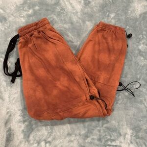Misguided orange tie-dye jogger sweatpants